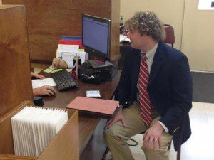 Pictured: Mac McQuillin files for the school board's District 2 seat.