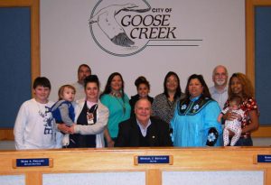 Pictured with Goose Creek Mayor Michael Heitzler at Monday’s ceremony are (l-r) Justin Sundown Stepp, Martin Novak, David Collins, Cheyenne Caddell, Tammy Sundown Stepp, Ashley Boren, Janie Shumak, Wassamasaw Tribe of Varnertown Indians Tribal Administrator Lisa Collins, Lorne Shumak, Larry Denny and Tiana Denny.