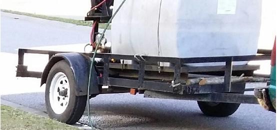 Pictured: An image of the actual trailer and tank rig stolen. (Via Goose Creek Police Department)