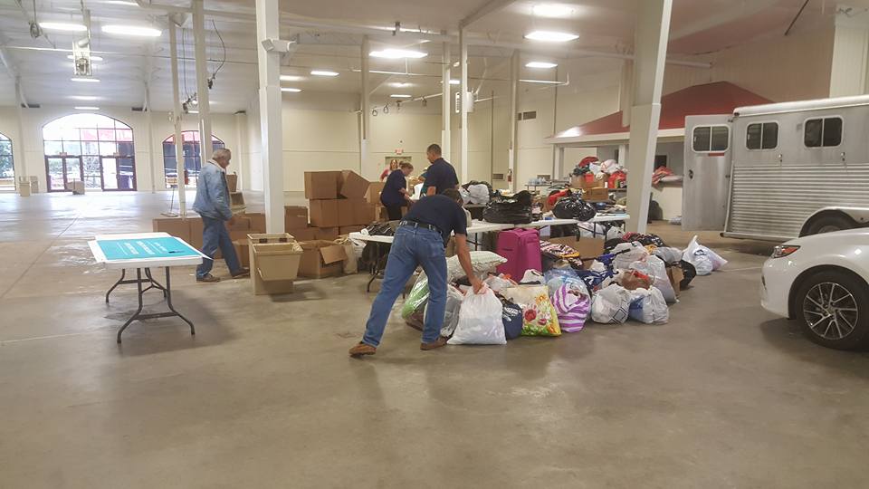 Pictured: Volunteers going through the donations.